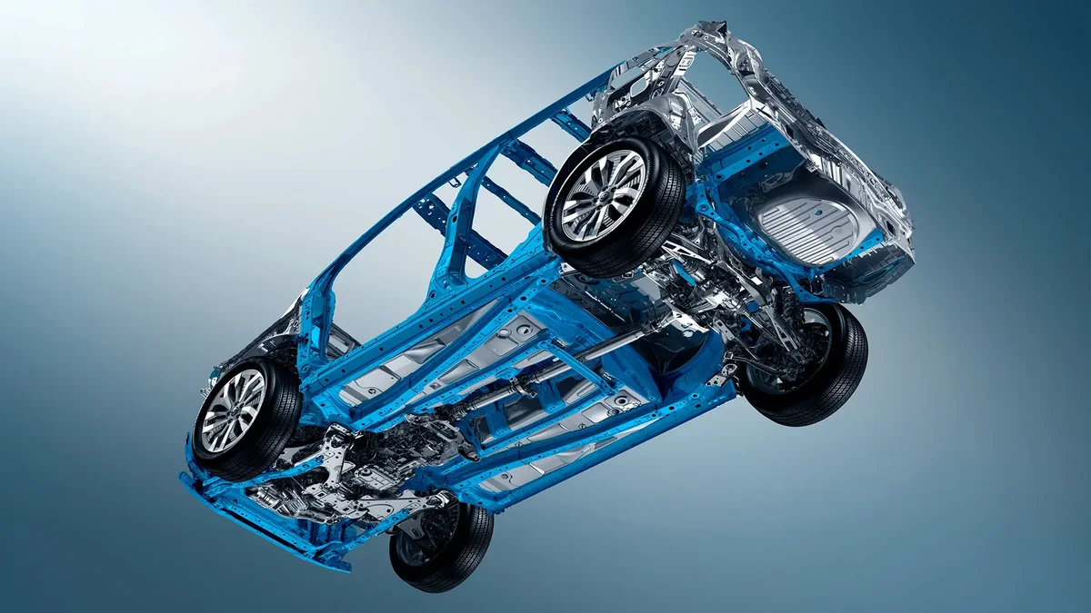 フォレスターの車体の骨格を斜め下から見た公式のイメージ。青い骨格にタイヤが付いている